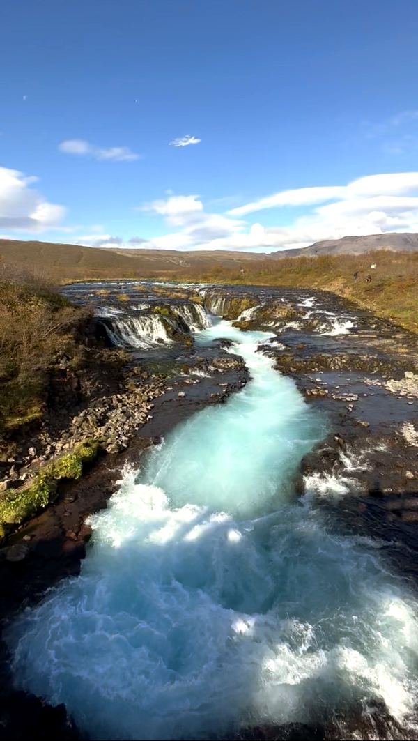 Brúarfoss, a bright blue waterfall