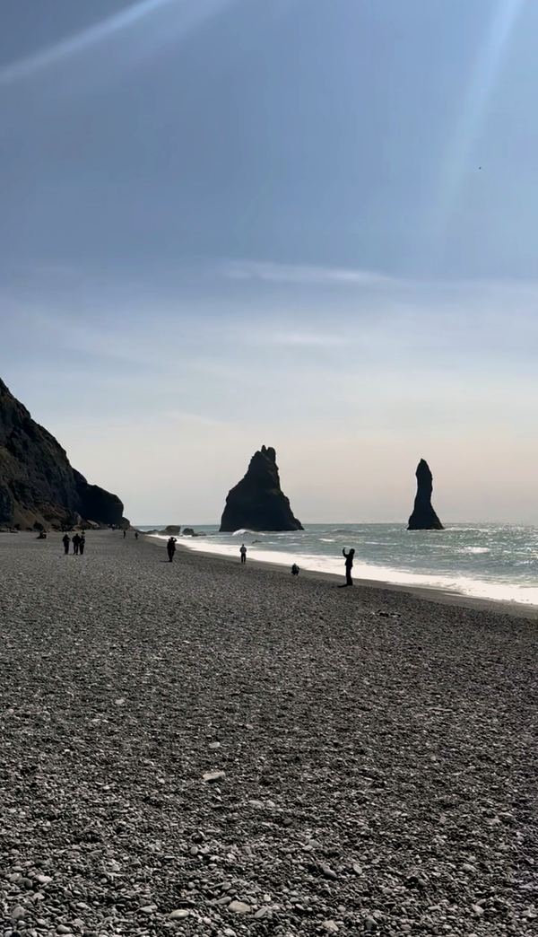 Black-sand Reynisfjara beach with the Reynisdrangar sea stacks